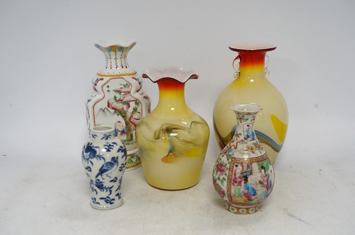 Two Dalian glass vases and three Chinese porcelain vases, 19th/20th century, tallest 19.5cm. Condition - fair